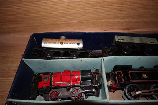 A quantity of mixed locos, track and carriages including Hornby